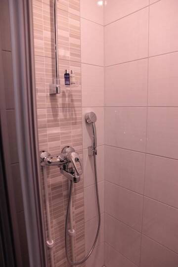 Фото номера Двухместный номер с 2 отдельными кроватями и дополнительной кроватью Отель Woikoski Feeling - Kirjokiven Kartano г. Joutsenlahti 9
